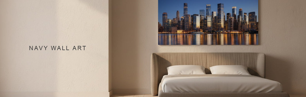 Navy wall art above a bed, a blue hour city skyline photograph on canvas