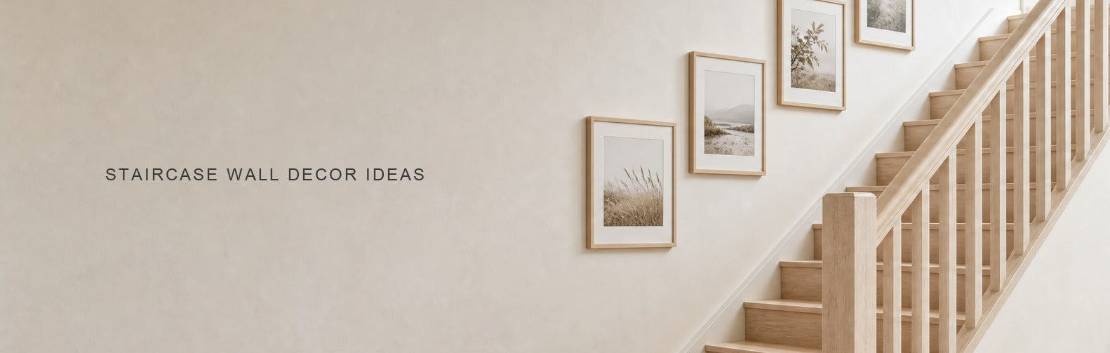Staircase wall decor ideas: framed prints stepped up a stairwell wall