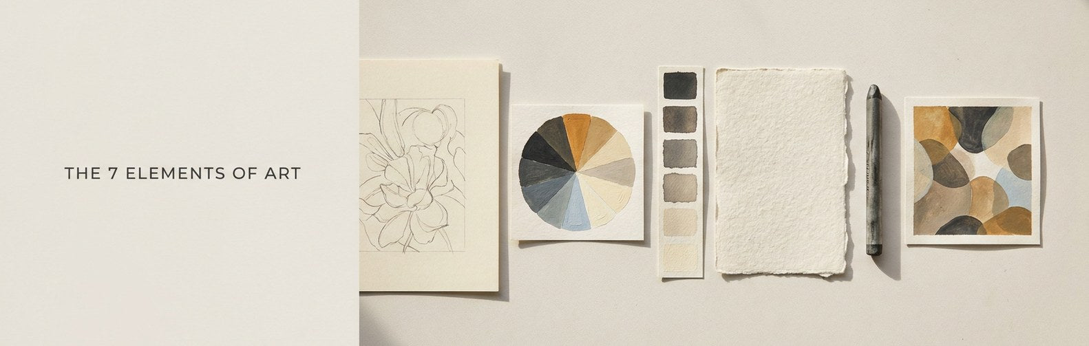 The 7 elements of art laid out on a worktable: a line study, color wheel, value swatches, textured paper and a shape study