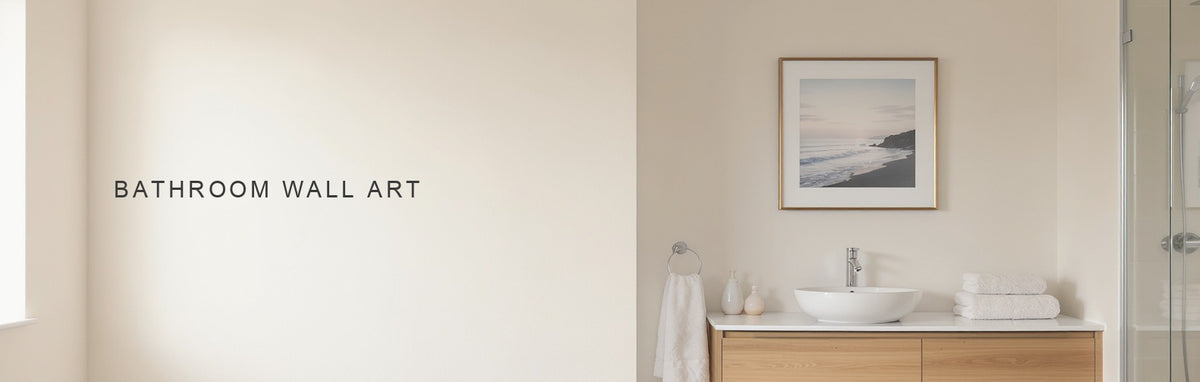 Bathroom wall art: a framed coastal print on the dry wall away from the shower