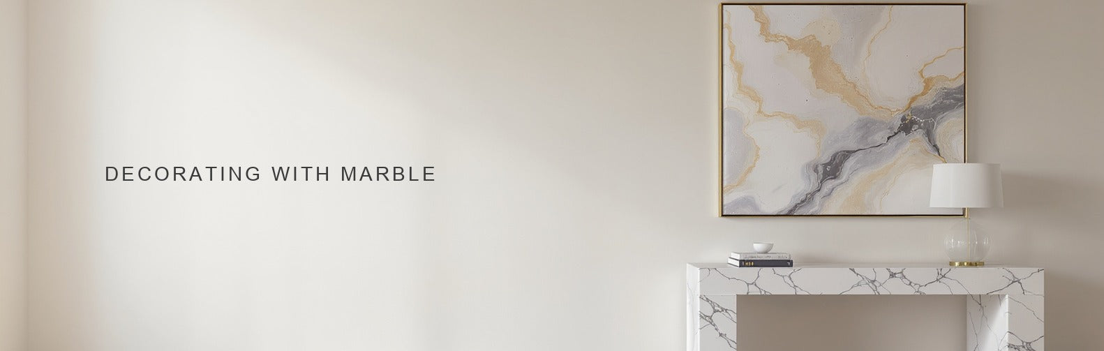 Decorating with marble: a soft marble toned canvas above a white marble console and brass lamp
