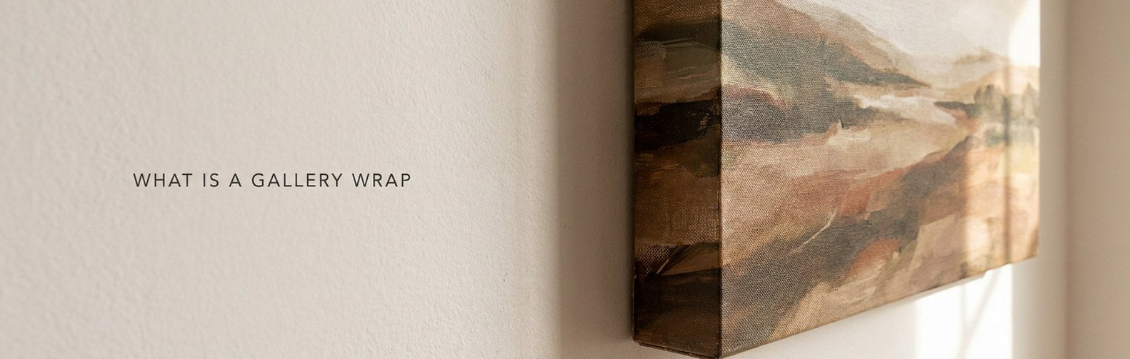 What is a gallery wrap canvas: an unframed stretched canvas showing the printed image continuing around the side edge