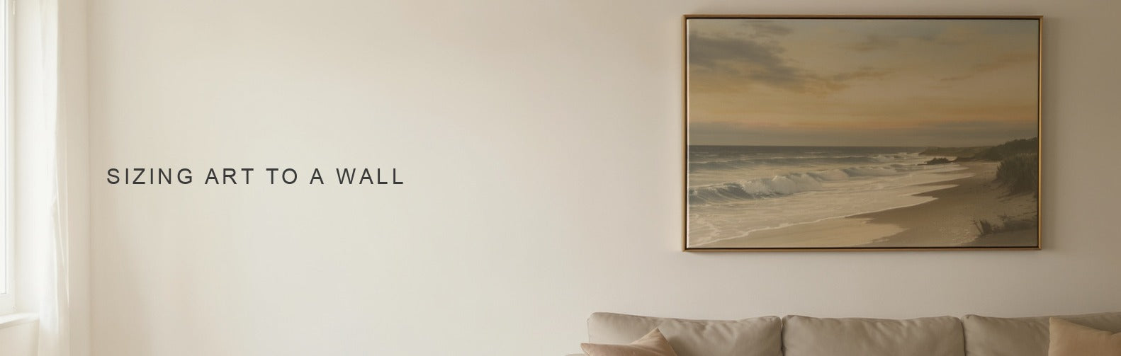 Sizing art to a wall: a canvas hung at about two thirds the width of the sofa beneath it