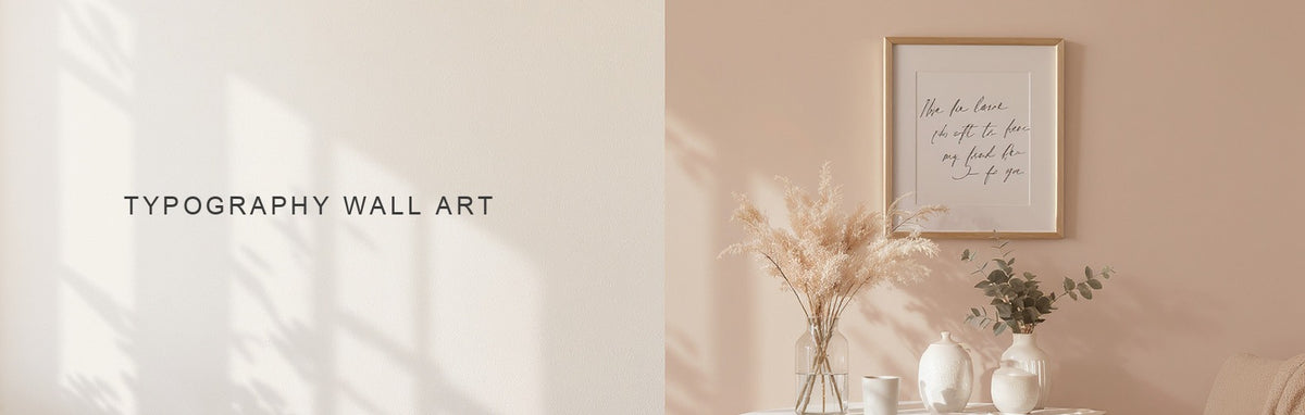 Typography wall art: a framed handwritten script print above dried roses in a blush and cream room