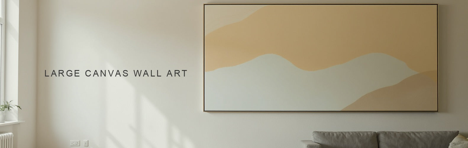 Large canvas wall art: one oversized gallery wrapped canvas dominating the wall above a low sofa