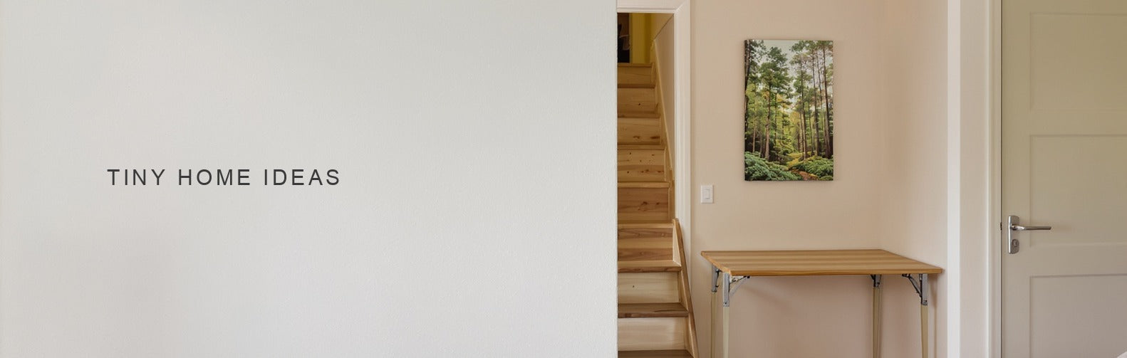 Tiny home ideas: a narrow vertical forest canvas beside a fold down table and built in storage steps