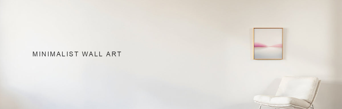Minimalist wall art: a single soft colour field canvas hung alone on a large empty wall