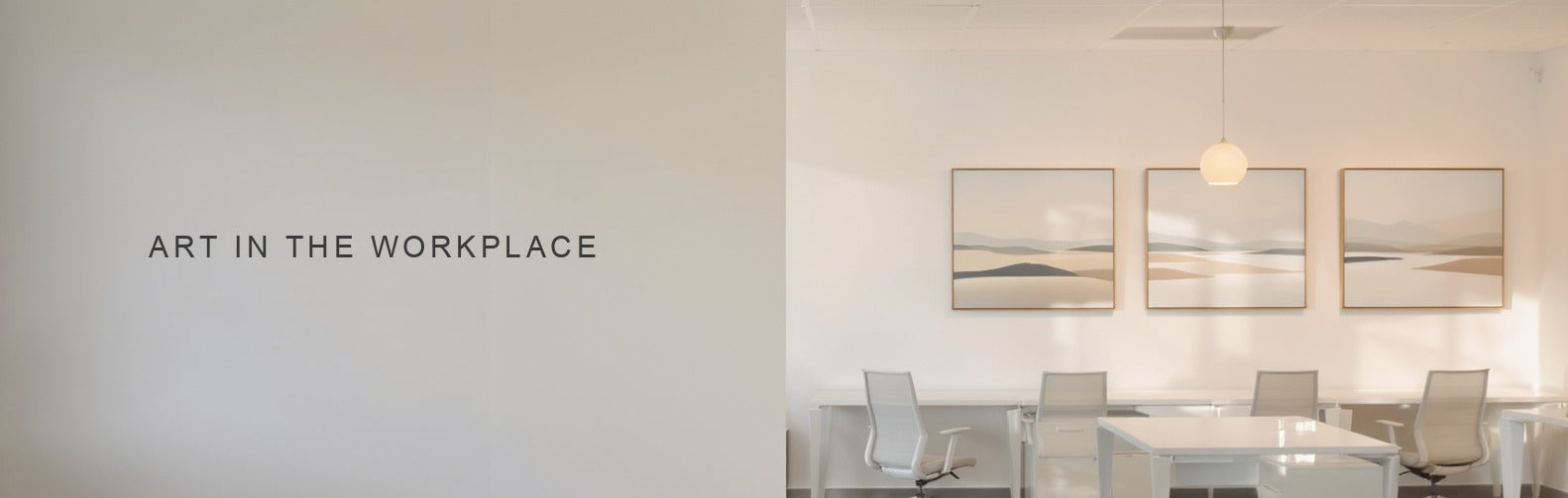 Art in the workplace: three calm abstract landscape canvases spaced along a bright open plan office wall