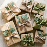 Wrapped gifts with ribbon and eucalyptus