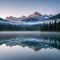 Lake Idyllic Wall Art canvas print, an idyllic mountain lake at dawn, mirror-still water reflecting snow peaks and pines
