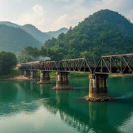 Kanchanaburi Wall Art canvas print, Kanchanaburi in Thailand, the steel truss railway bridge over the wide green river