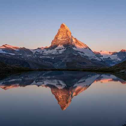 Matterhorn Wall Art canvas print, the Matterhorn, the sharp lone pyramid peak catching first alpenglow above a still