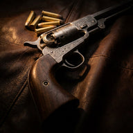 Gun Wall Art canvas print, an antique engraved revolver and brass cartridges laid on dark worn leather