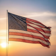 Patriotic Wall Art canvas print, a patriotic American artwork, a weathered stars and stripes flag rippling in wind