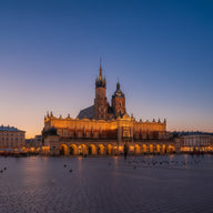 Krakow Wall Art canvas print, the arcaded cloth hall and the twin-towered basilica on the great market square at dusk