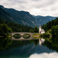 Lake Bohinj Wall Art canvas print, Lake Bohinj in Slovenia, a still glacial lake with a stone arch bridge and small church