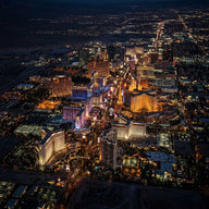 Las Vegas Wall Art canvas print, Las Vegas at night, the lit strip of resort towers seen from above against the dark desert
