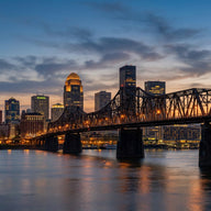 Louisville Wall Art canvas print, the skyline along the Ohio river at dusk with the lit steel truss bridge in the foreground
