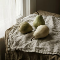 Small Wall Art canvas print, three pears on a rumpled linen cloth beside a window