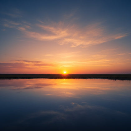 Sunrise Wall Art canvas print, sunrise over a still landscape, the sun just clearing a low horizon