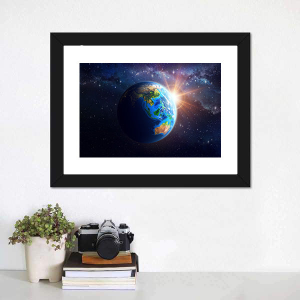 Illuminated Face Of The Earth In Space Canvas Wall Art