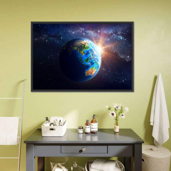 Illuminated Face Of The Earth In Space Canvas Wall Art