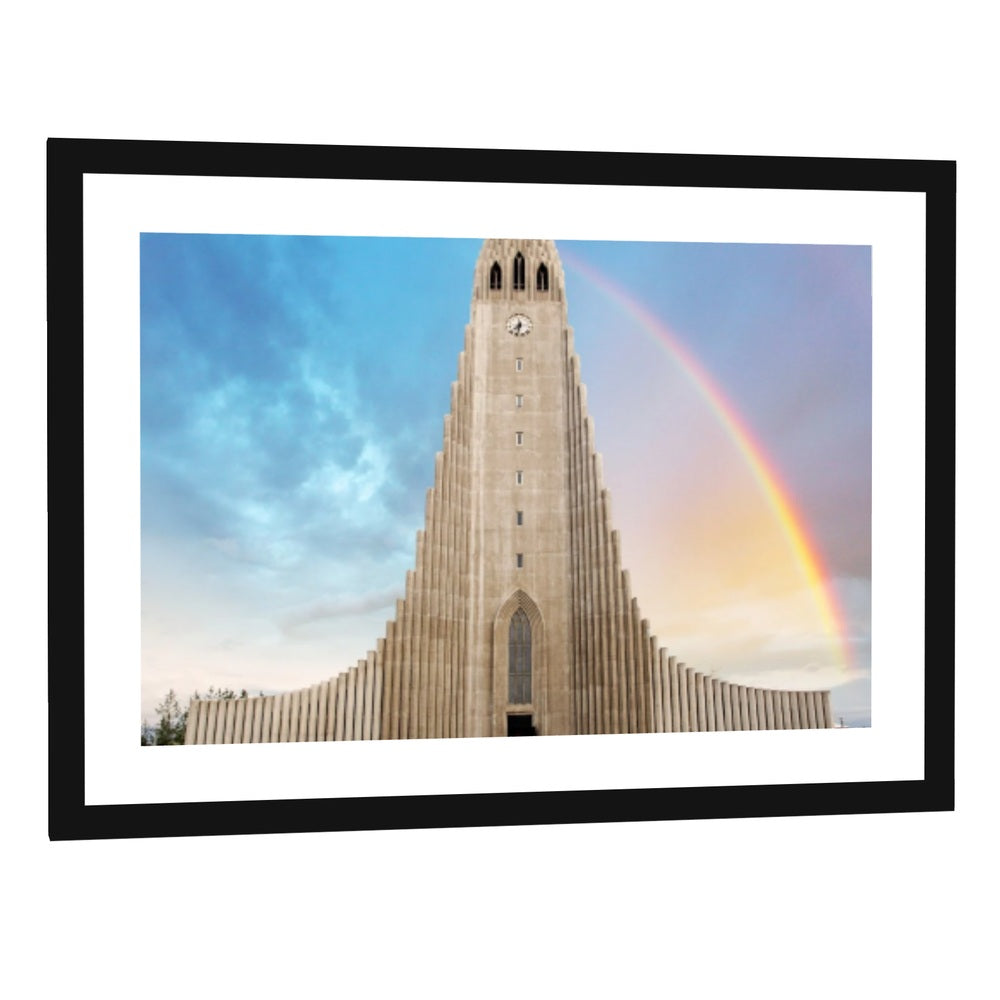 Hallgrimskirkja Cathedral with Rainbow Canvas Wall Art - single panel framed print with white mat in a black frame