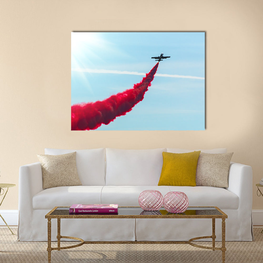 Airplane fly With Red Trail Smoke Canvas Wall Art
