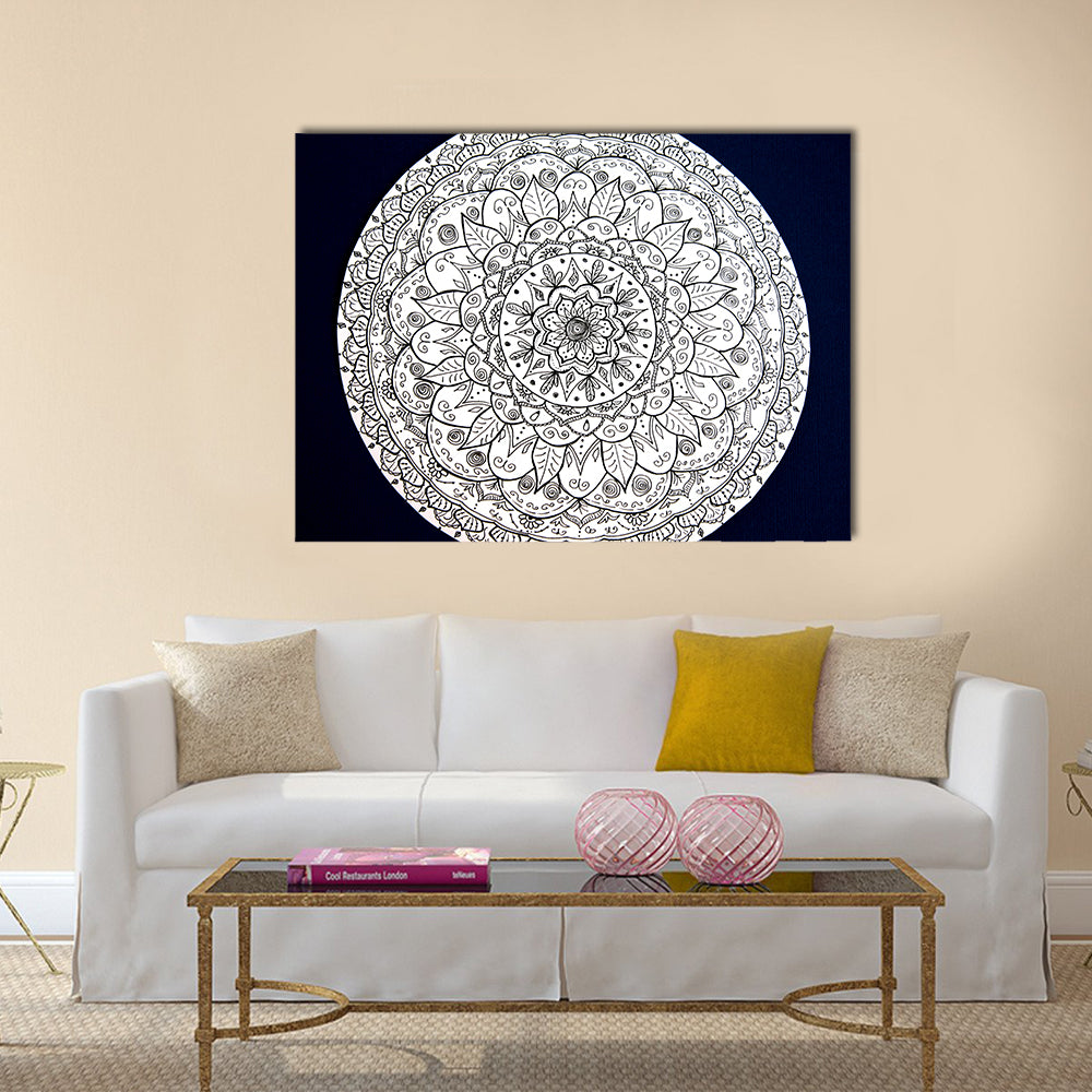 Ornamental Flower Mandala Canvas Wall Art in black, white and navy, single panel hung on a wall