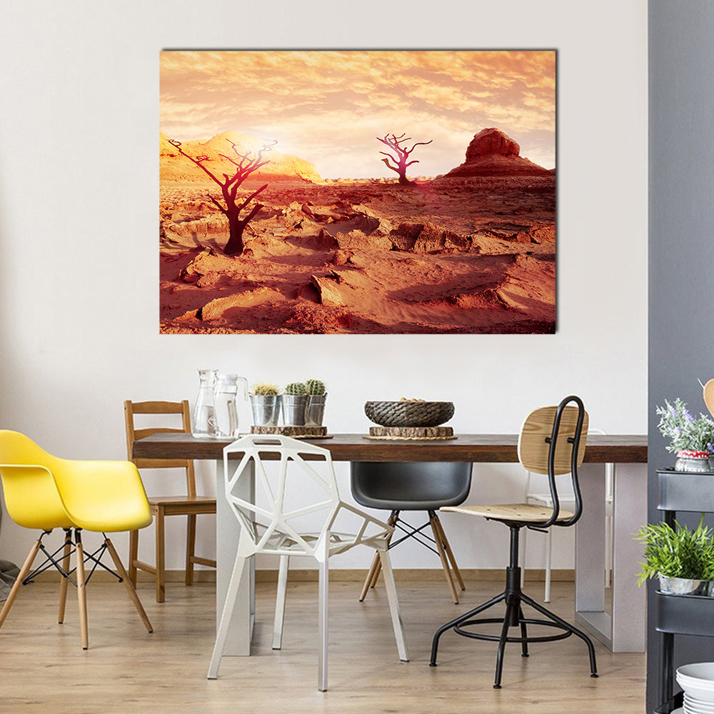 Dry Trees in the Desert Canvas Wall Art in brown, orange and yellow, single panel hung on a wall