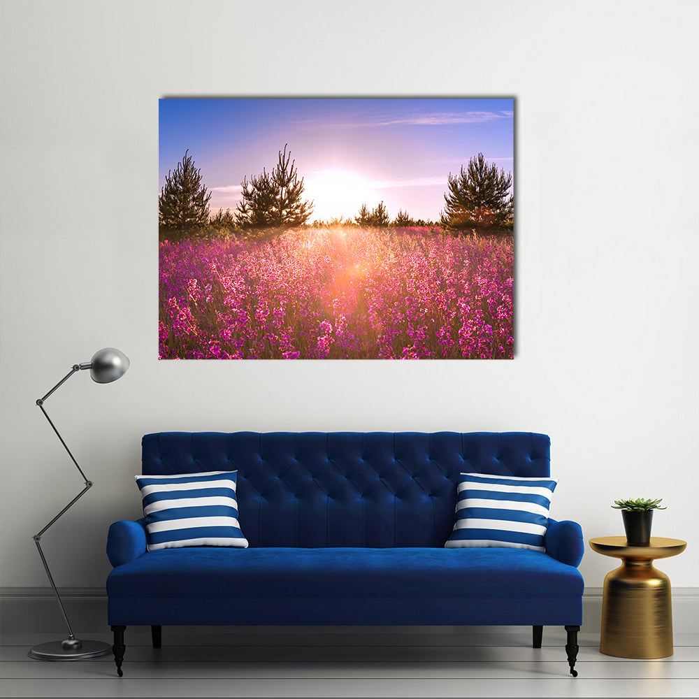Blossoming Meadow at Sunrise Canvas Wall Art in blue, purple and pink, single panel hung on a wall