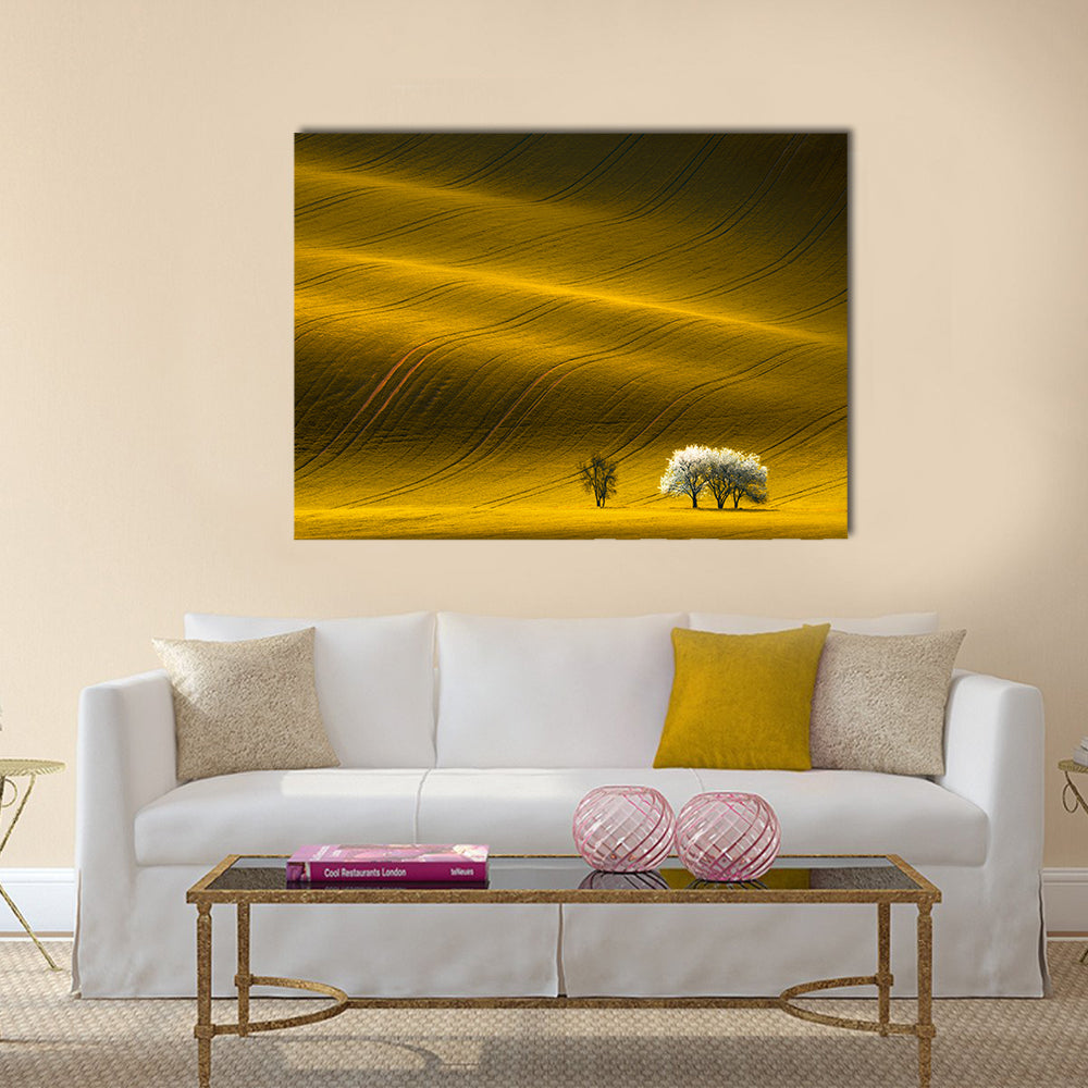Spring Wavy Yellow Rapeseed Field Canvas Wall Art in brown, gold and yellow, single panel hung on a wall