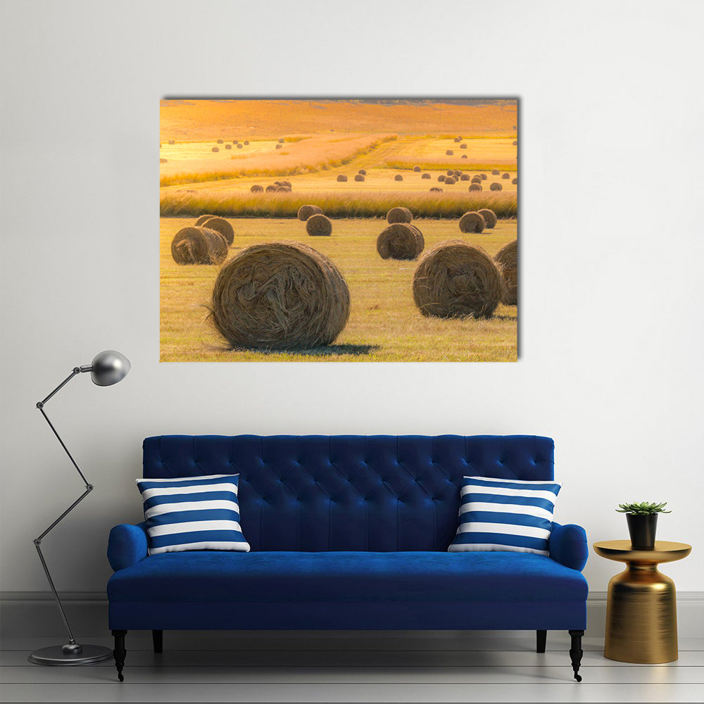Hay Bales On Golden Field At Sunset Canvas Wall Art