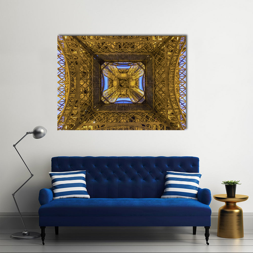 Internal Structure of the Eiffel Tower, Paris Canvas Wall Art in gold, yellow and blue, single panel hung on a wall