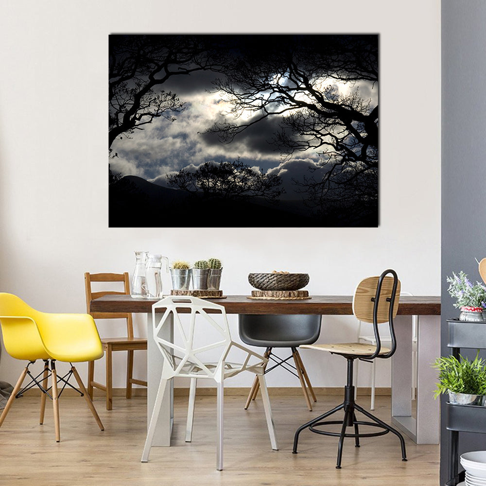 Silhouetted Trees Under Storm Clouds Canvas Wall Art