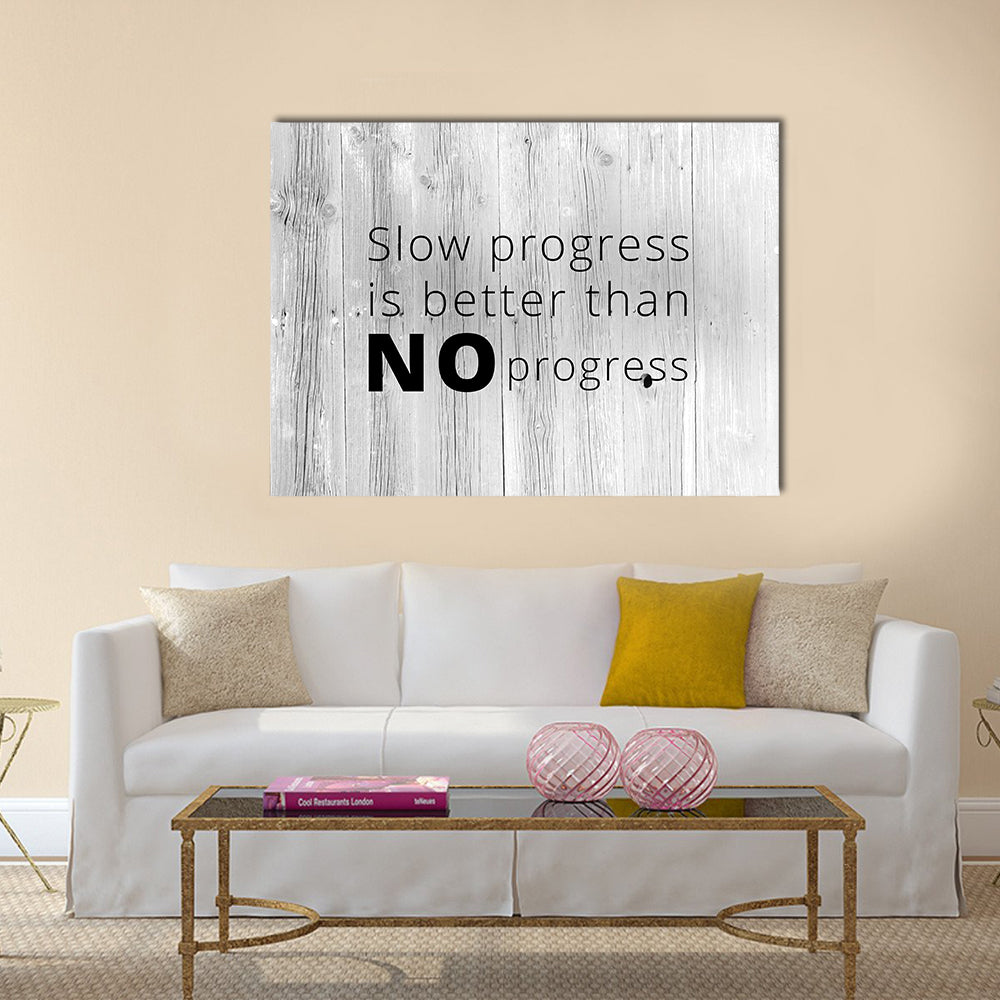 Keep Working Quote on White-washed Wood Canvas Wall Art in black, white and gray, single panel hung on a wall