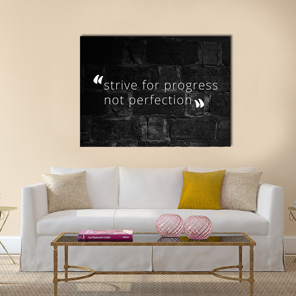 Strive for Progress Not Perfection Quote Canvas Wall Art in black and white, single panel hung on a wall