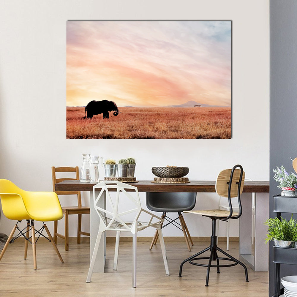 Lonely Elephant in Savannah Sunset Canvas Wall Art in brown, orange and pink, single panel hung on a wall
