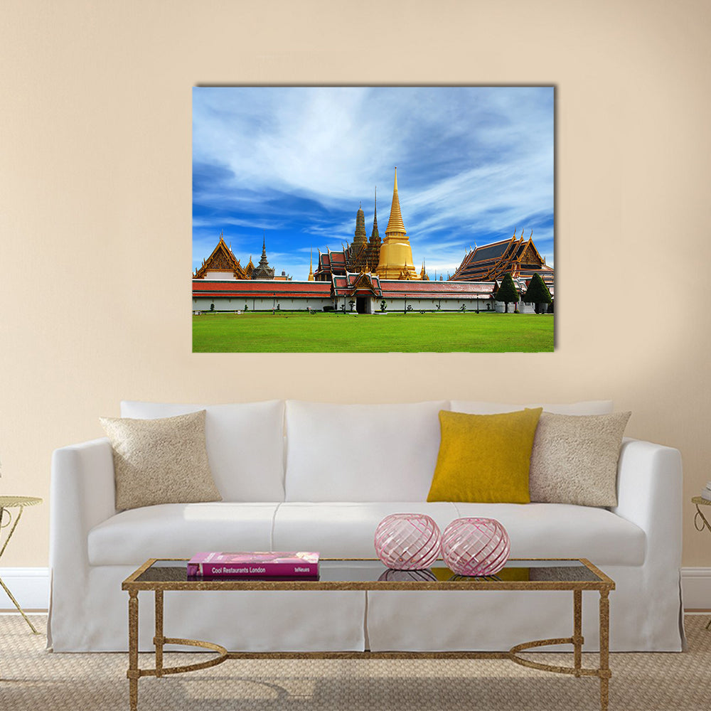 Wat Phra Kaeo Emerald Buddha Temple In Bangkok Canvas Wall Art in gold, green and blue, single panel hung on a wall