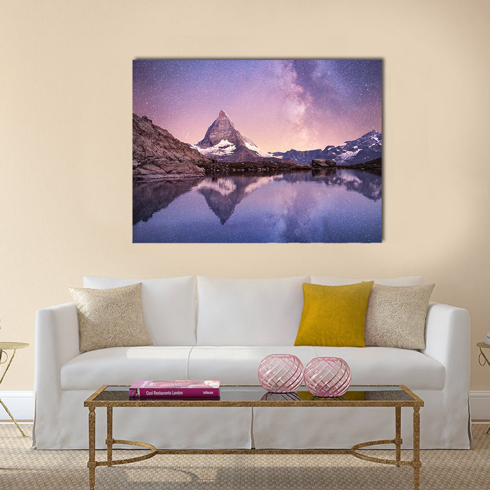 Milky Way Over Matterhorn Canvas Wall Art in blue, purple and pink, single panel hung on a wall