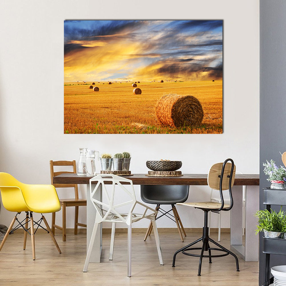 Golden Sunset Over Farm Field With Hay Bales Canvas Wall Art