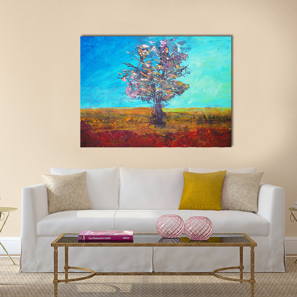 Solitary Blossom Tree in Field Canvas Wall Art in red, yellow and blue, single panel hung on a wall