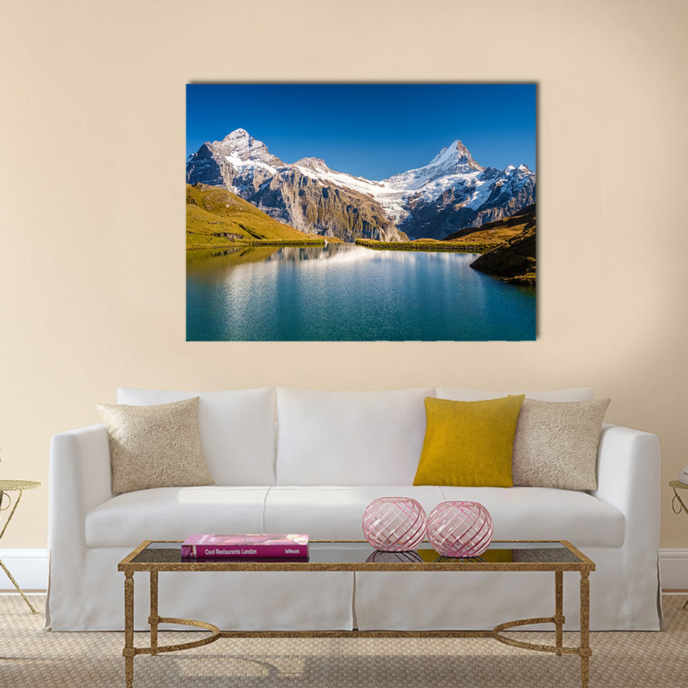 Grindelwald Bernese Alps In Switzerland Canvas Wall Art in white, brown and blue, single panel hung on a wall