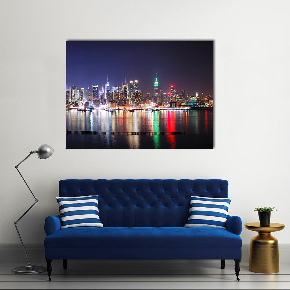 Times Square Reflections Over Hudson River Canvas Wall Art in black and blue, single panel hung on a wall
