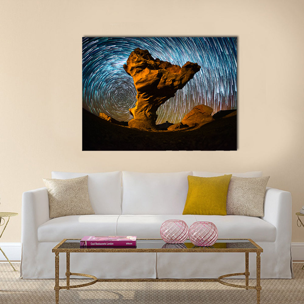 Arbol de Piedra Stone In Bolivia Canvas Wall Art in black, orange and blue, single panel hung on a wall
