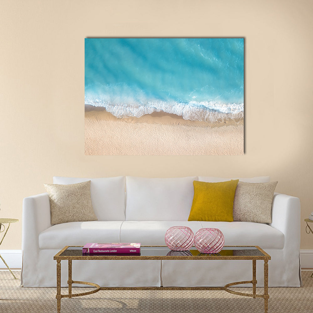 Summer Seascape From Top Canvas Wall Art in white, beige and blue, single panel hung on a wall