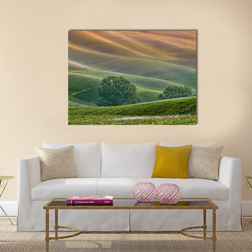 Tuscany Rolling Hills at Golden Hour Canvas Wall Art in orange, yellow and green, single panel hung on a wall