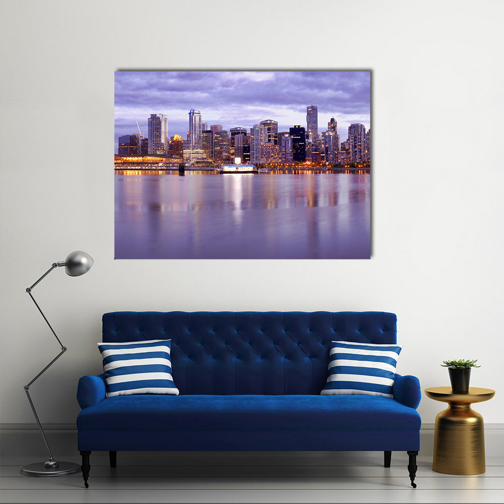 Vancouver Skyline In Canada Canvas Wall Art in yellow, blue and purple, single panel hung on a wall