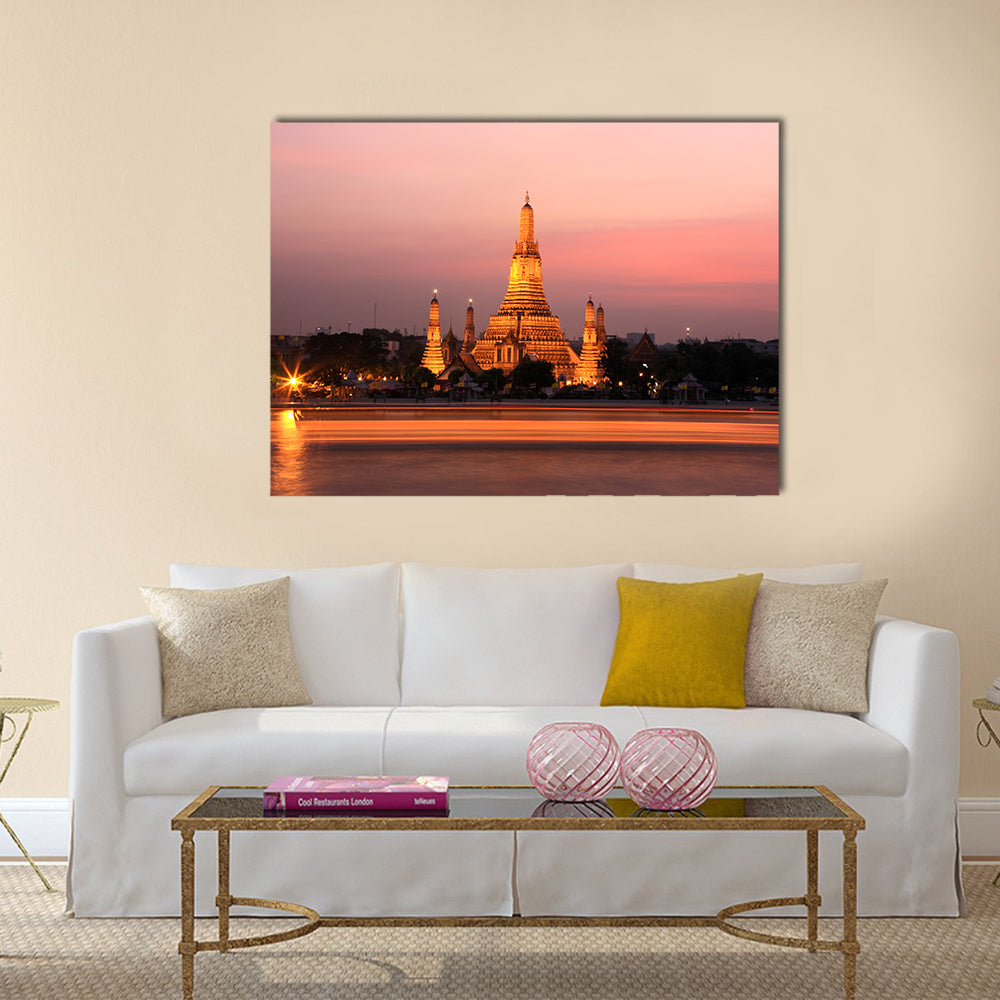 Wat Arun Temple At Sunset In Bangkok Thailand Canvas Wall Art in gold, orange and pink, single panel hung on a wall
