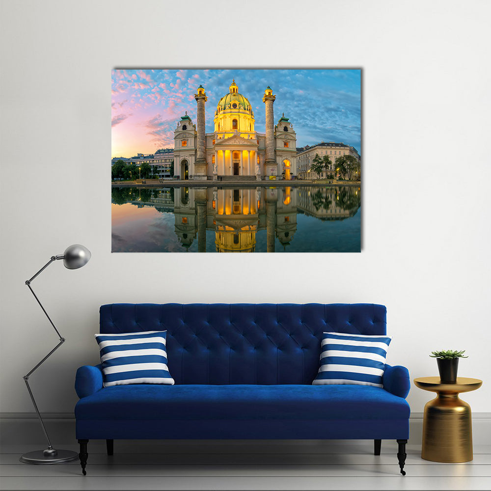 St. Charles Church Sunset Reflection Canvas Wall Art in orange, yellow and blue, single panel hung on a wall